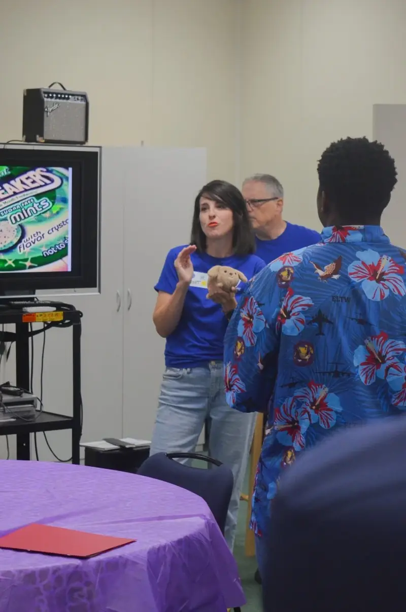 A Lifescaping facilitator leading an icebreaker activity for students