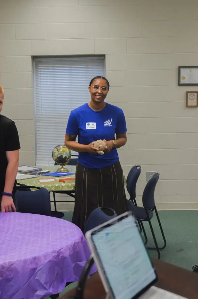 A Lifescaping team member welcoming students to the session